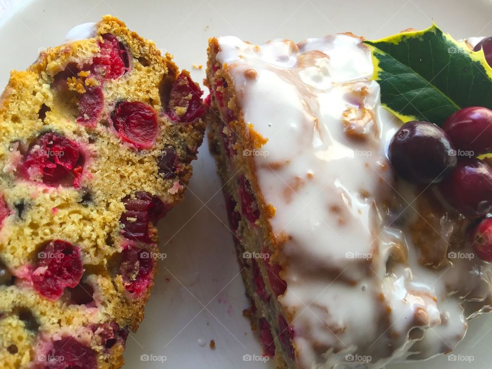 Cranberry loaf cake with icing and holly