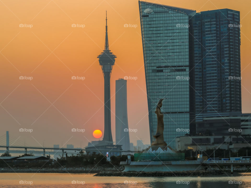 View of the High Tower and buildings around the Heart of the City at Sun Down.