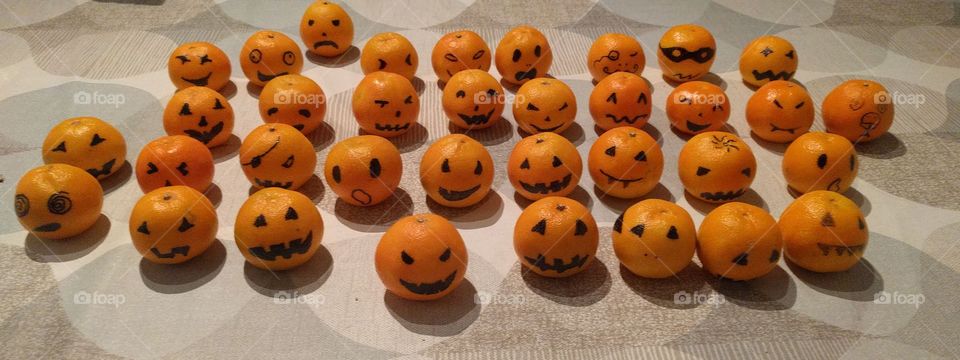 army of little pumpkins ready to take over the world at Halloween.