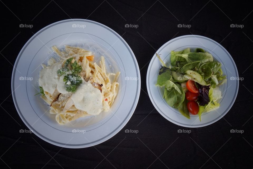 fettuccine alfredo and salad