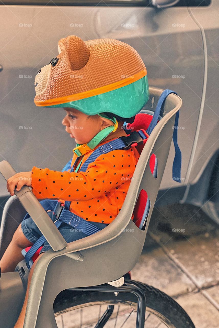 Baby ready for a bike ride, baby girl riding with mommy, bear bike helmet, baby seat on back of bike