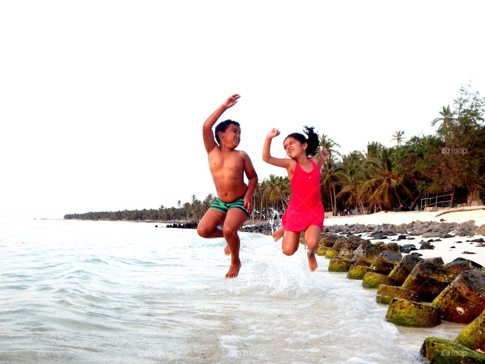 child fun at the beach is the most exciting and pleasing to eyes to cherish the moment
