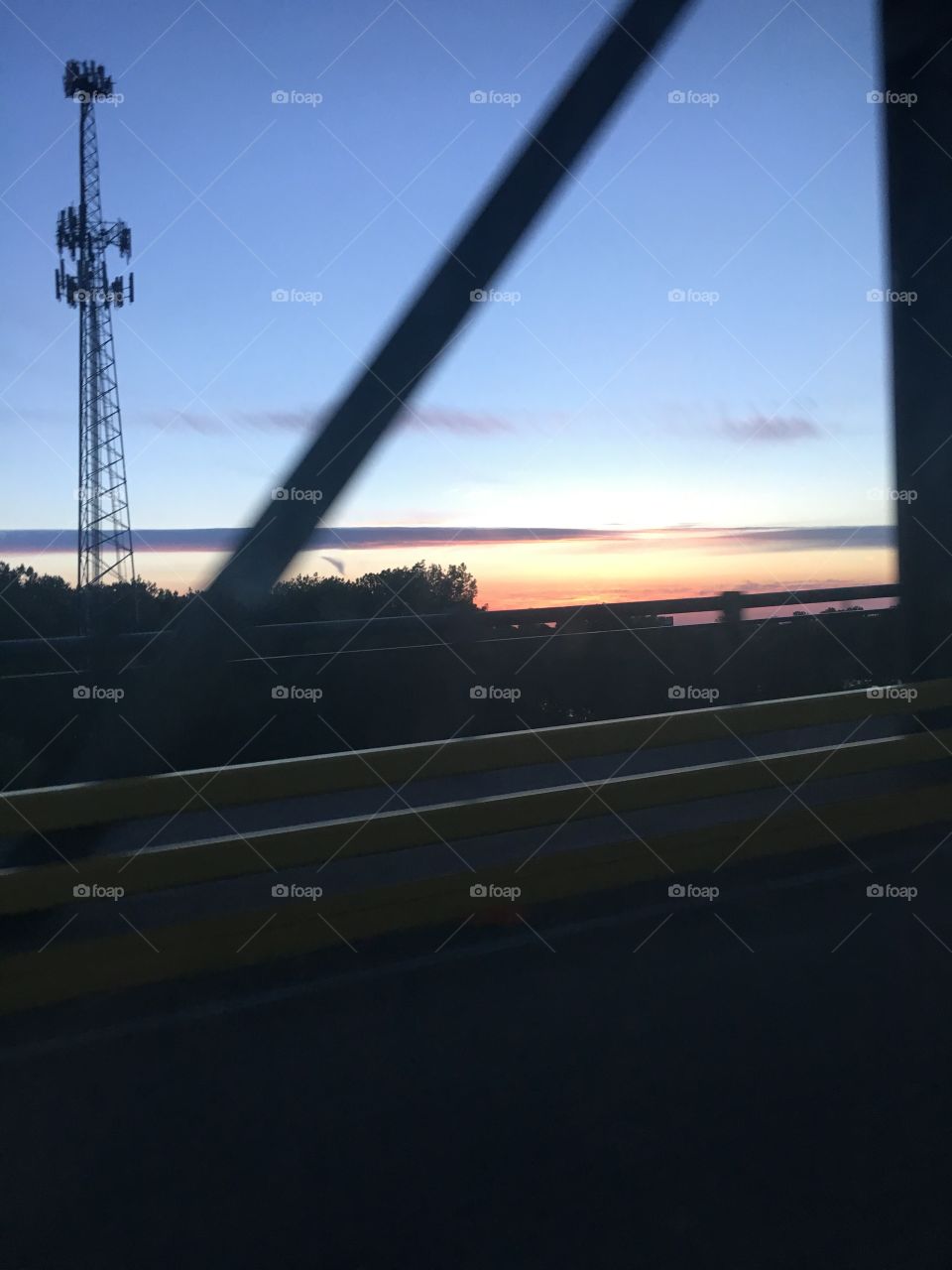 Sun Setting as The Moon Rises 