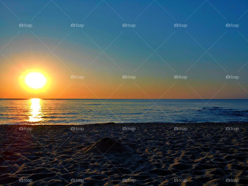 Sunset on beach beautiful seaside