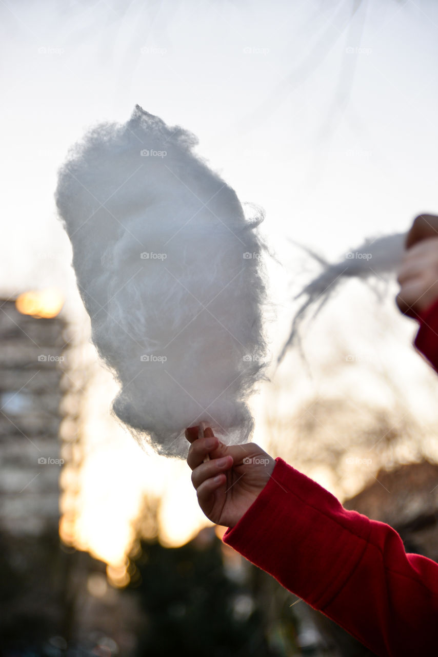 Hand holding a cotton candy