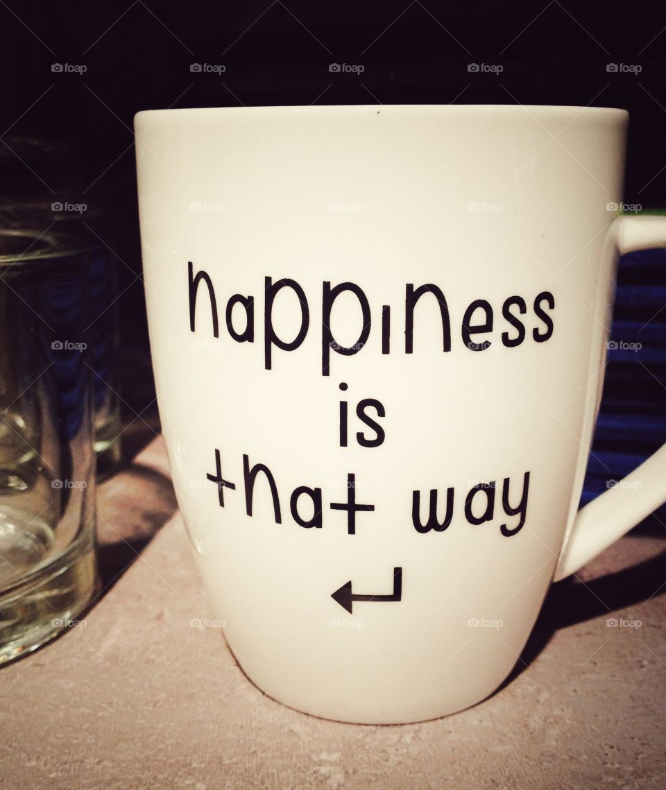 A cup of happiness. Happiness is that way... Best thing is: You can turn the cup in which way you want, so happiness is everywhere