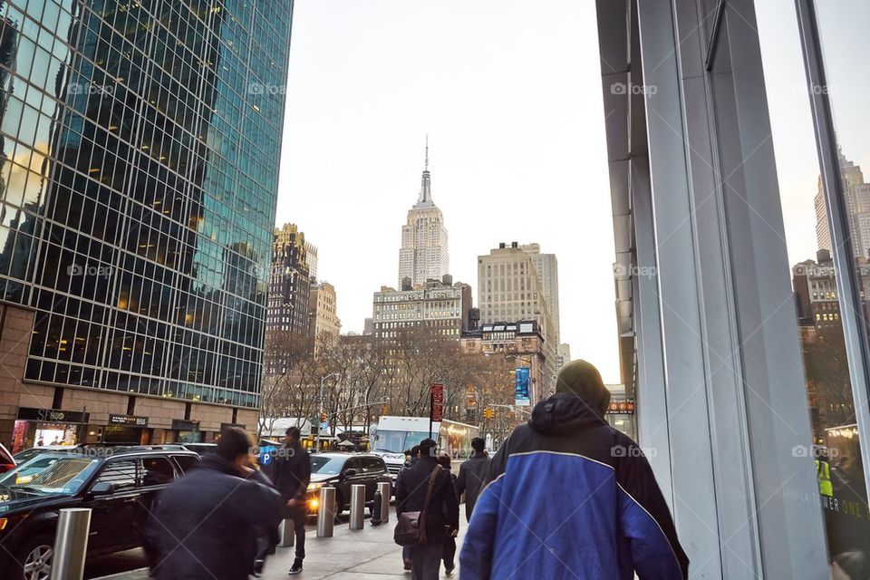 chrysler building on a cold winter day with pedestrians walking by