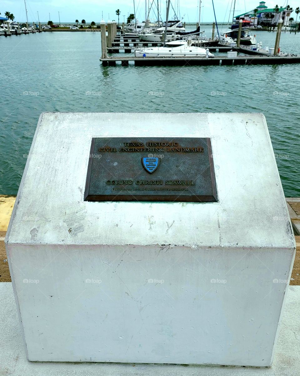 Commemorative seawall plaque