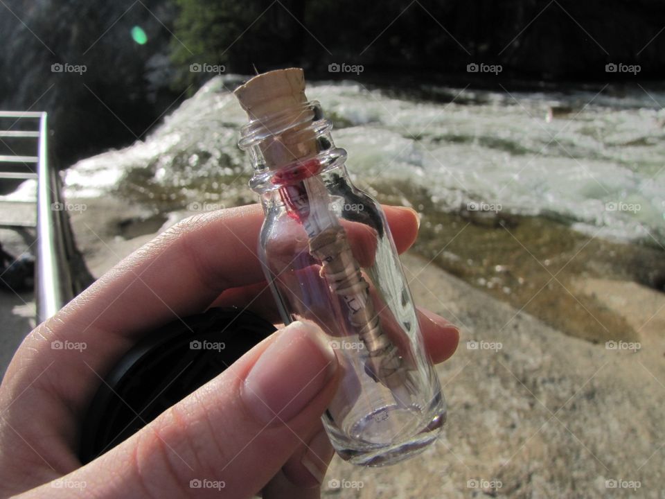 Message in a bottle. Going off a waterfall