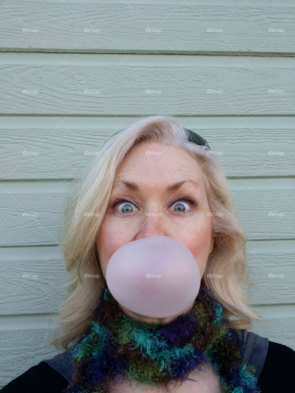 Woman Blowing a Bubble