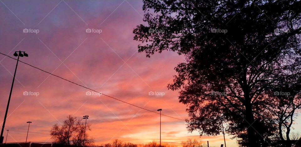 Elegant strokes of color painted across clouds in a beautiful sunset on a lovely evening