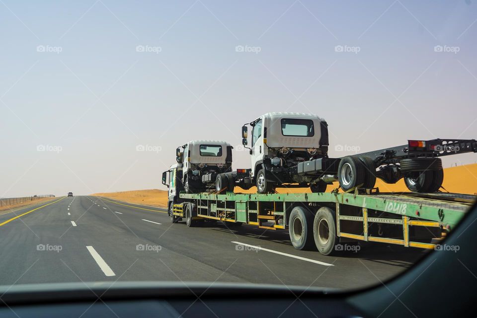 Transportation of trucks in a truck . Editor’s choice. Photo of the week 