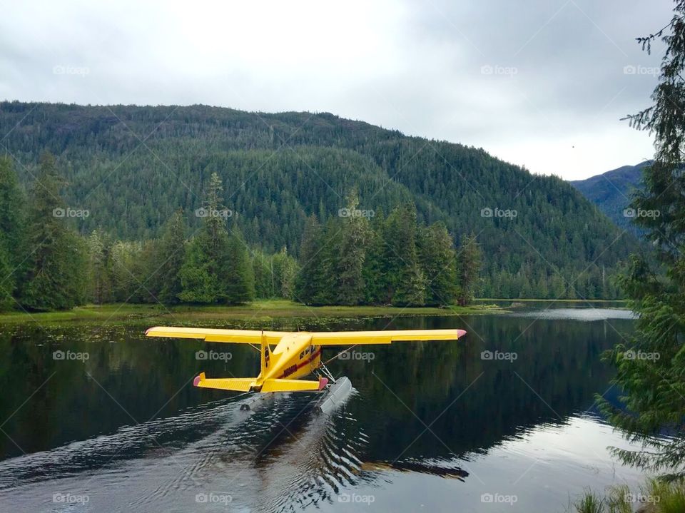Float Away. Dropped off by float plane to a remote location in Alaska. All signs of civilization leaving...