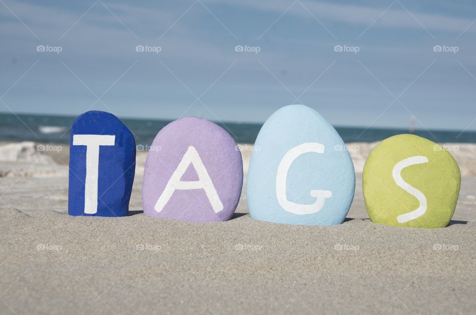 Concept of tags on colourful stones