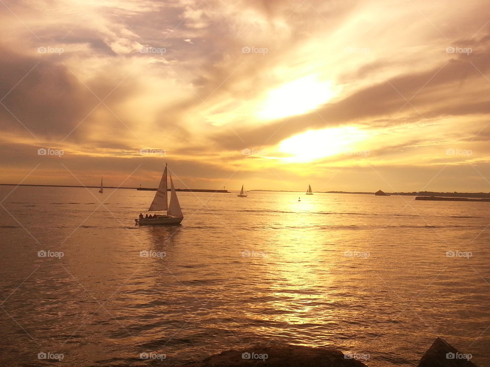 sunset on sailboat. sunset on sailboat