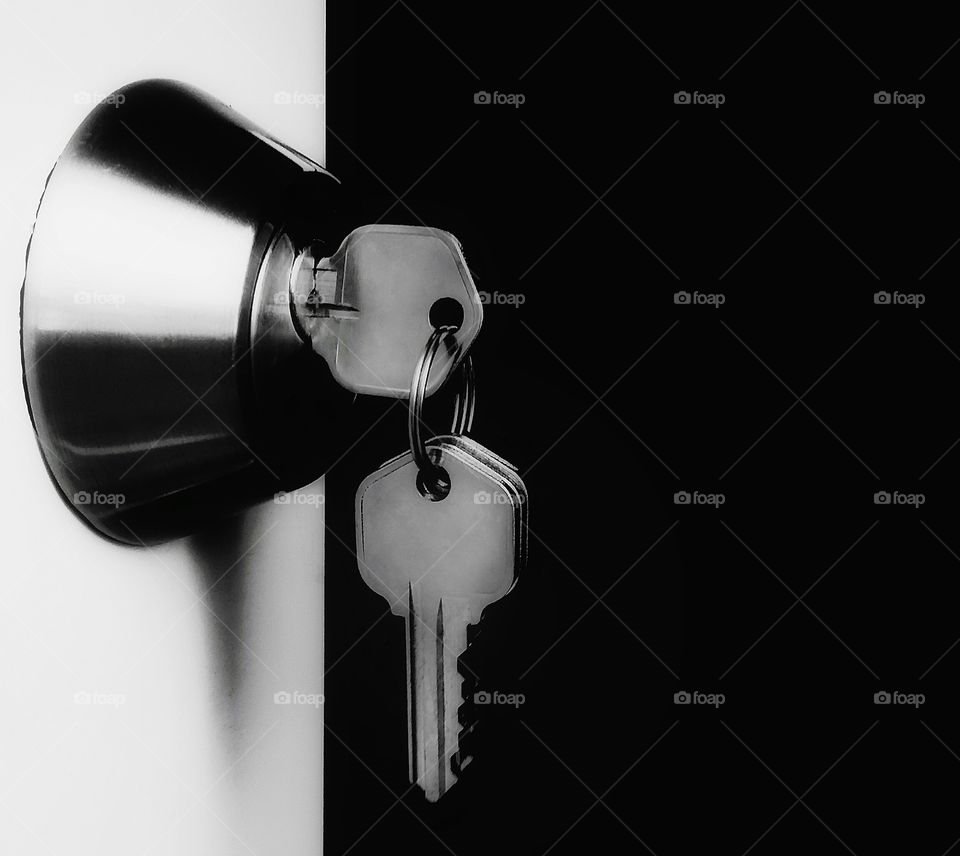 The keys to unlocking a door using the rule of thirds and negative space in black and white