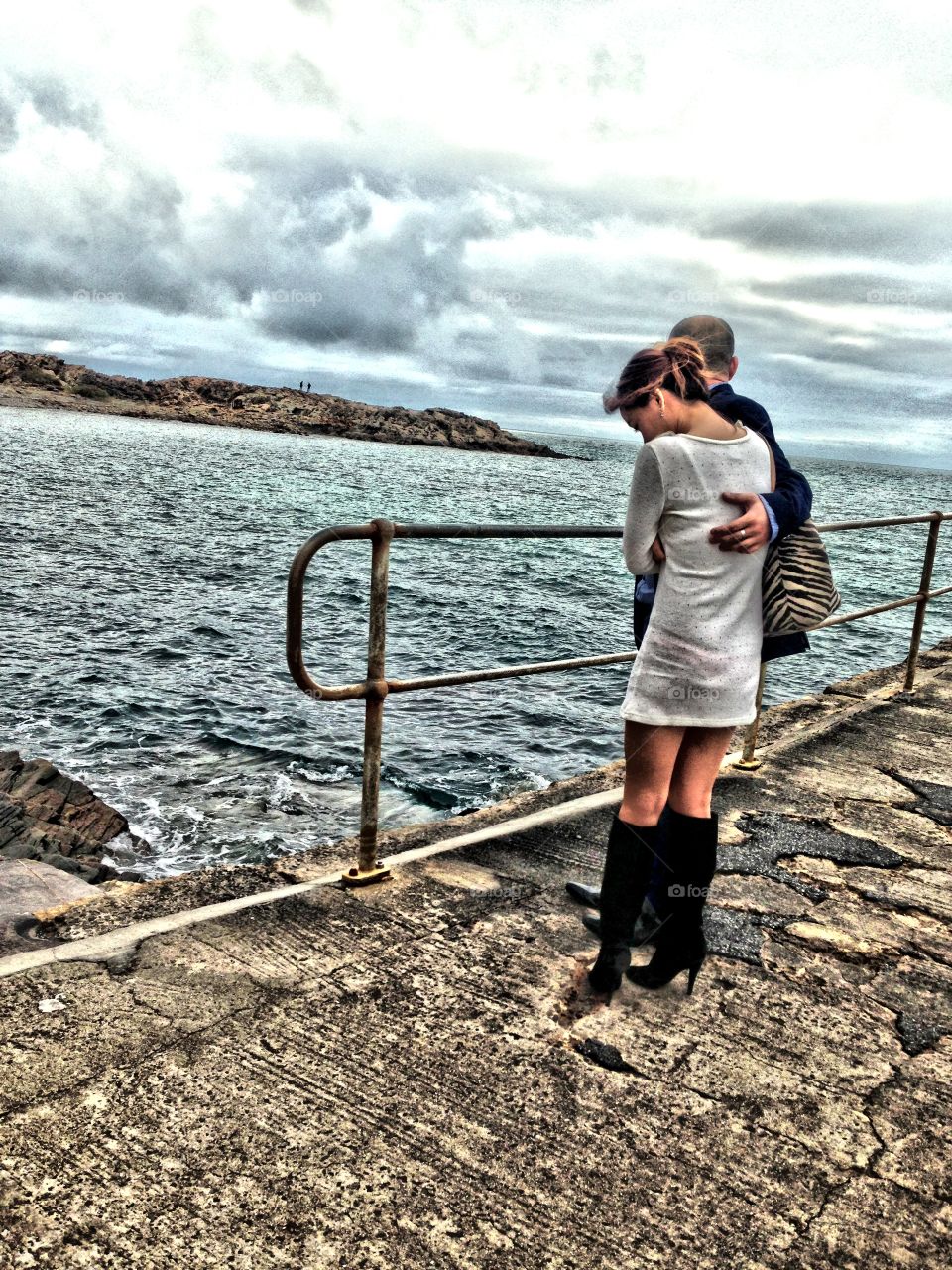 Troubled lovers/couple. Troubled lovers on seaside walk, South Australia