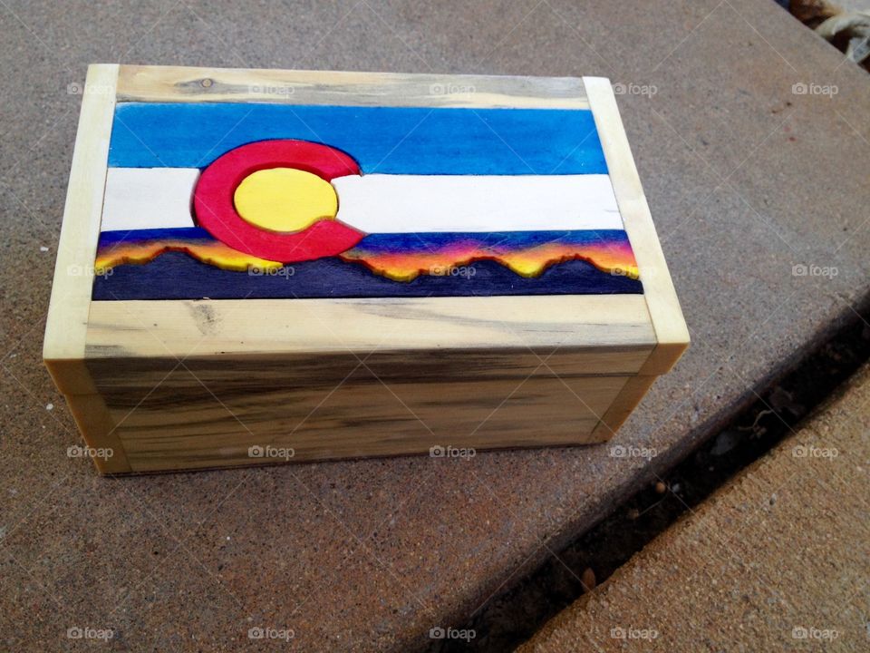 Colorado. Colorado flag on a wooden box made from beetle kill pine and aspen