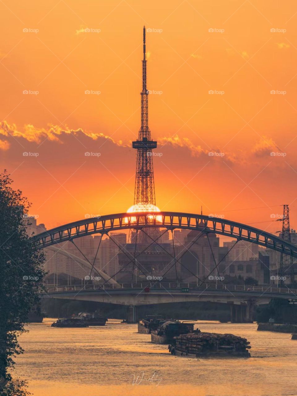 Tower and bridge at sunset