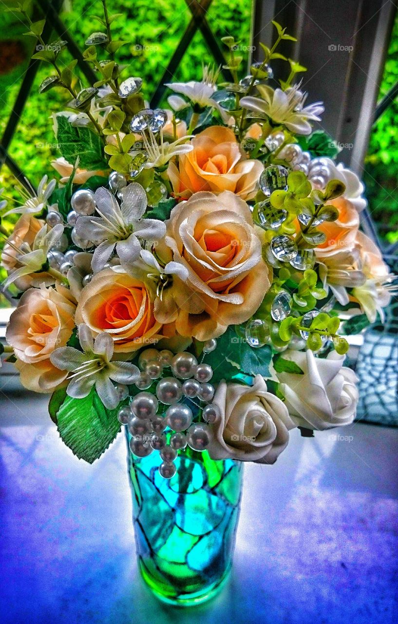flowers in sunlight . handmade vase and flowers 
