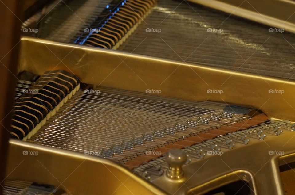 Inside a baby grand piano