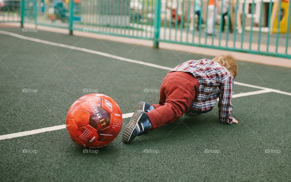 Child prepare for a game of football