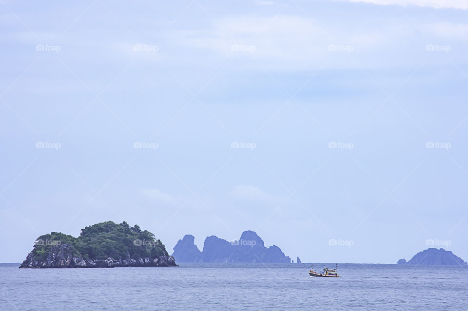 The beauty of the island and the fishing boats in the sea at Chumphon in Thailand.