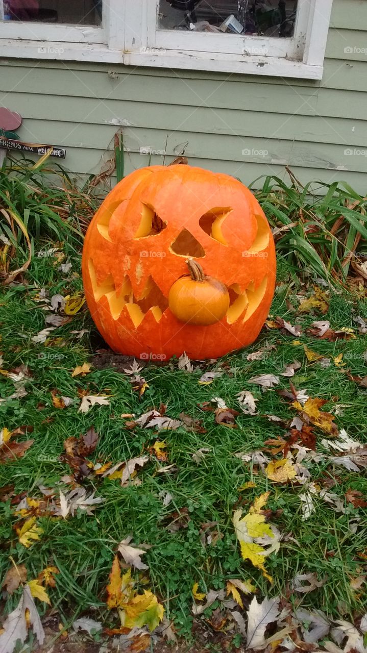 My other Daughter's pumpkin. Carving huge pumpkins!!!