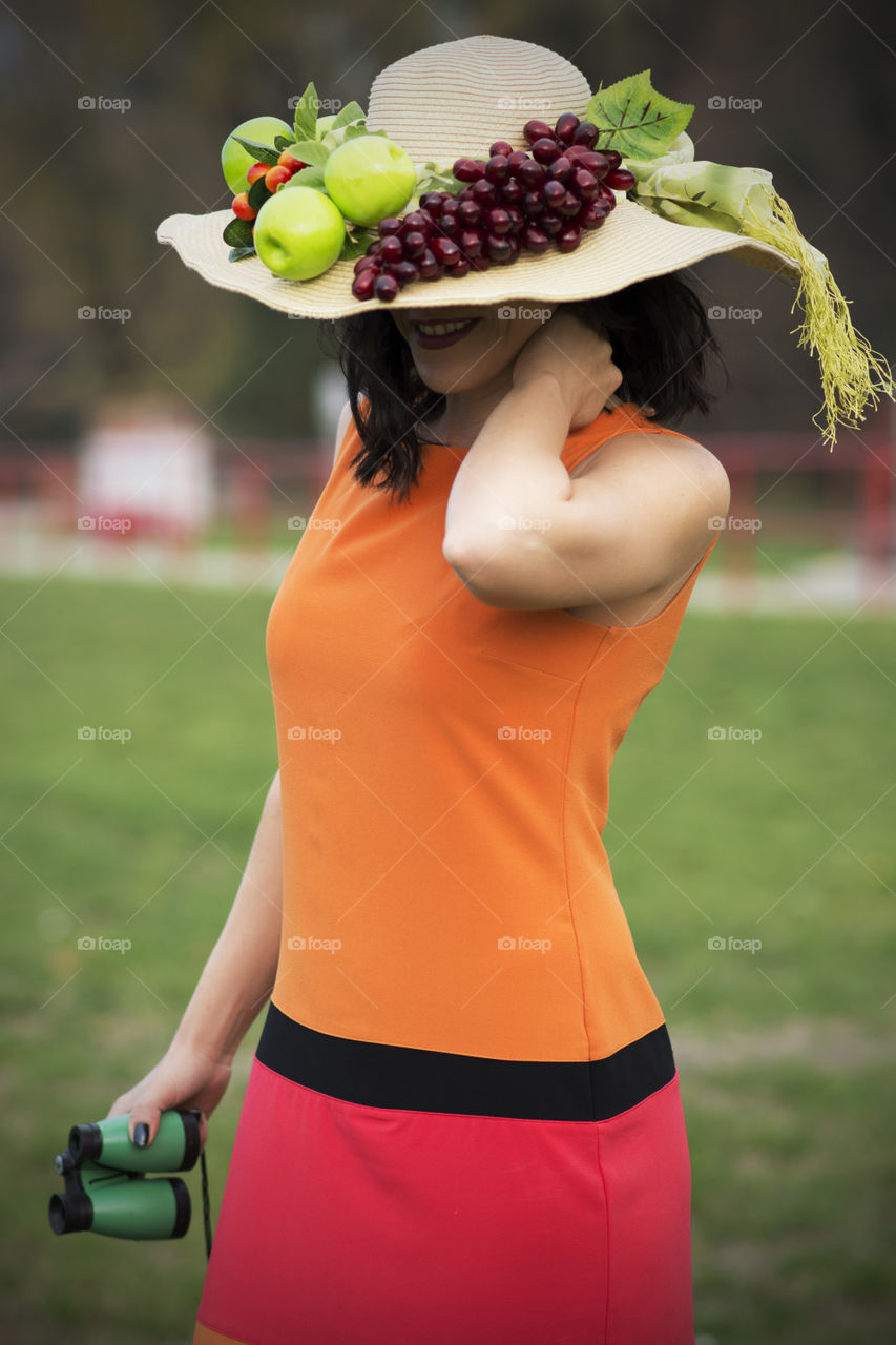 Close-up of a woman wearing hat