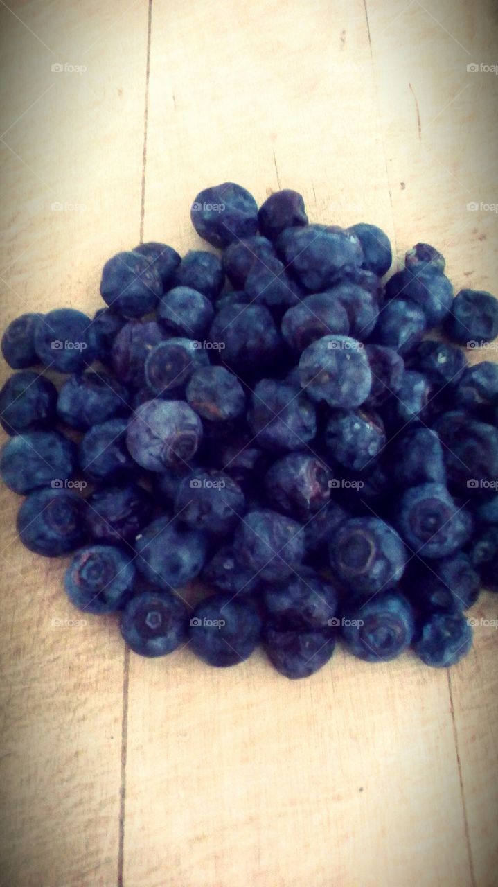 Big group of round healthy fresh blueberries