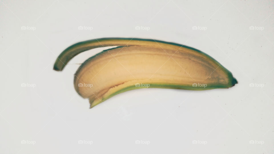 peeled banana white background