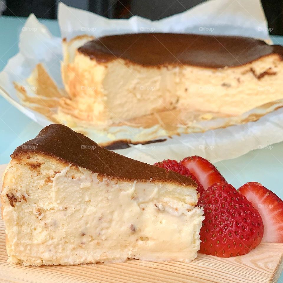 Basque burnt cheesecake with charred burnt top and creamy gooey insides 