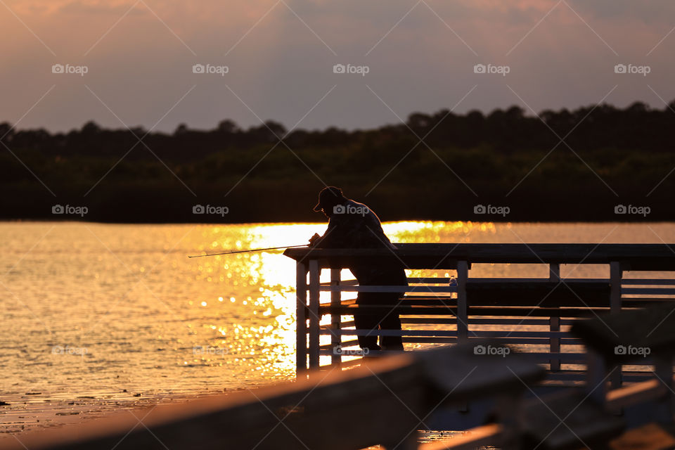 Sunset Fishing. Fishing gets better as Florida sun goes down slowly, cooling the air a little. 