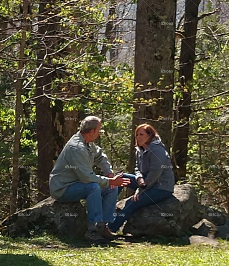 Couple talking outside