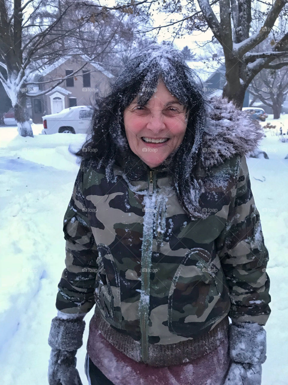 My mom all covered in snow 