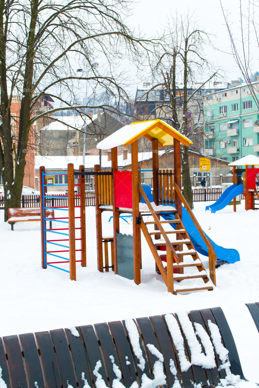 Child playground. Snow Winter.