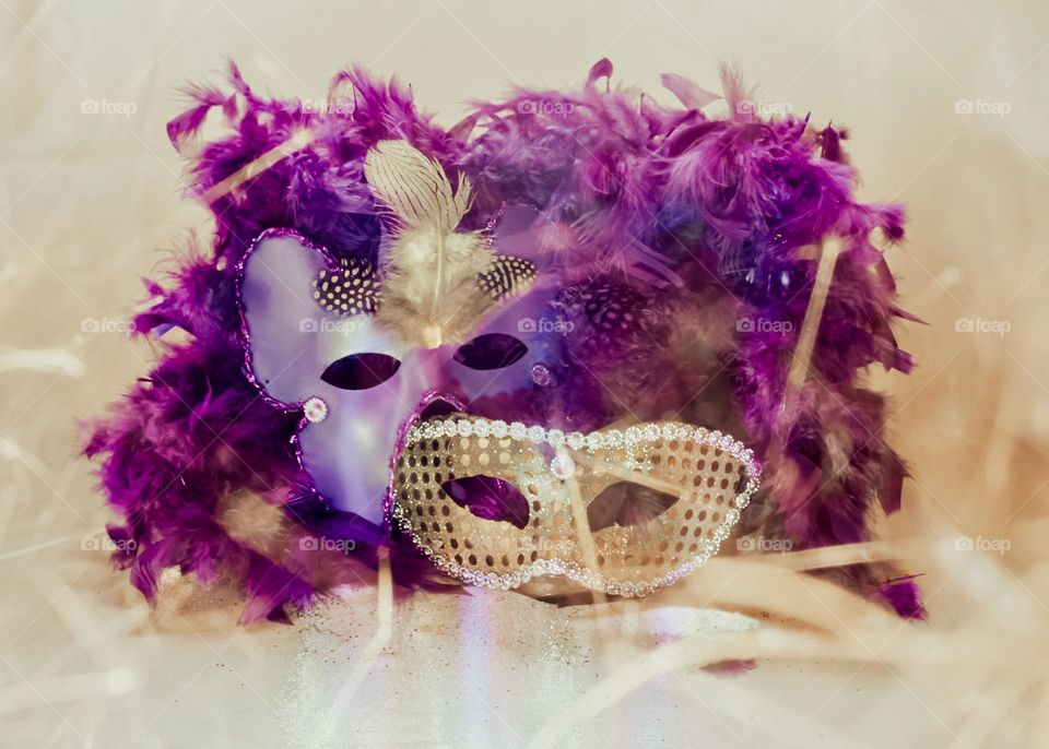 Costume masks with feather boa in purple & gold (sparkler moved around the lens to give it that party vibe!)