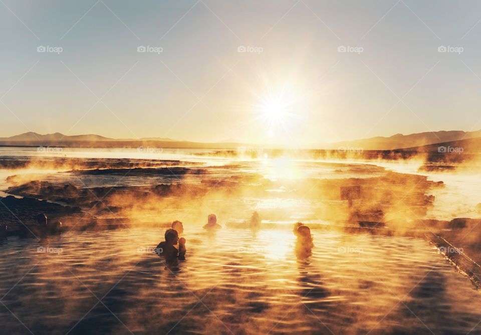 Enjoying a warm hot spring on a icy cold morning