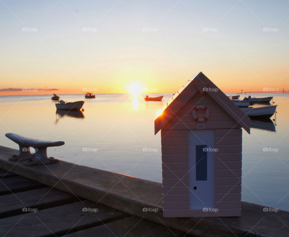 Miniature beachhut in sunset