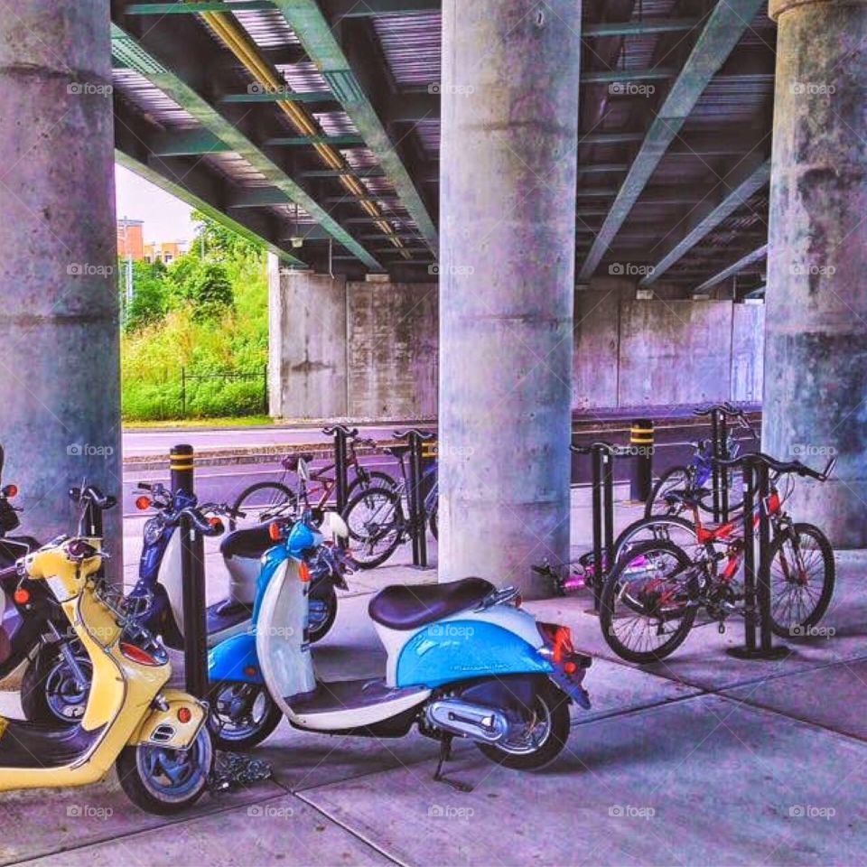 The bikes and mopeds waiting for their riders 