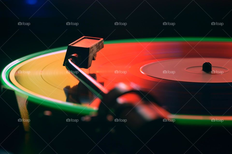 Old vinyl record player. The photo was taken with a shutter speed of more than 4 seconds.