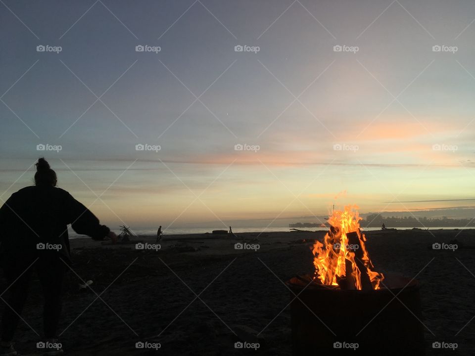 Dancing by the fire. Seabright Beach in Santa Cruz, CA 