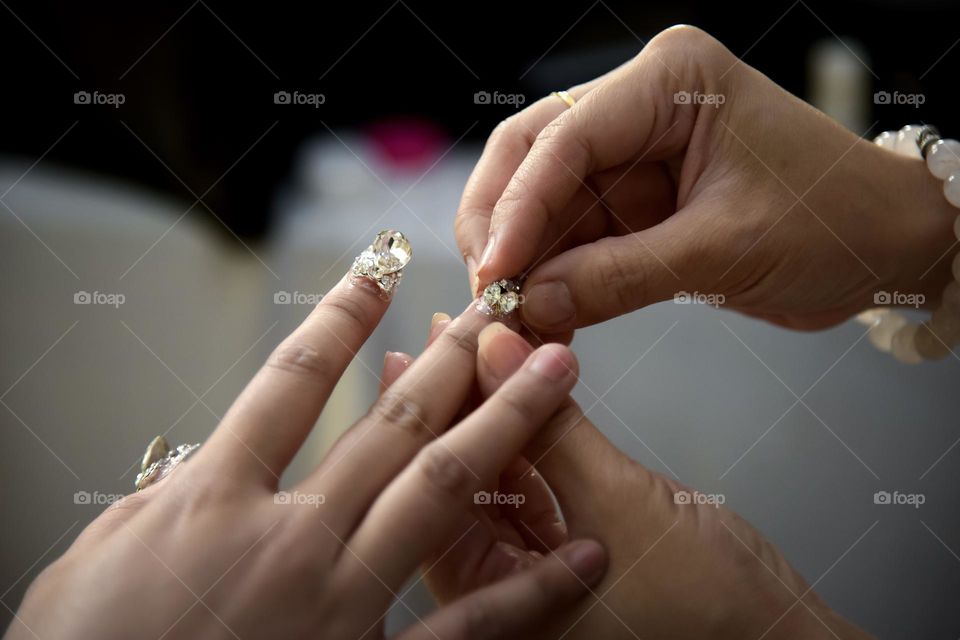 The main function of nails is to protect the fingertips which are soft and full of nerves, and enhance touch. Nails are not part of the bone but are made of a protein called keratin. Keratin is not only found in nails, but also in skin and hair.
