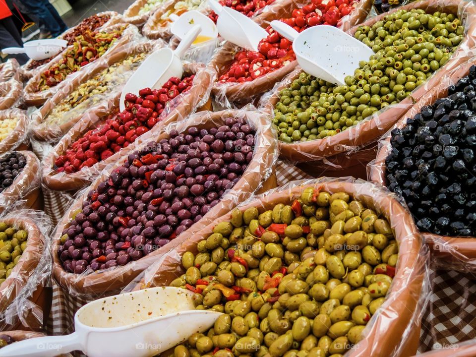 Fresh olives and vegetables from a northern Italy market 
