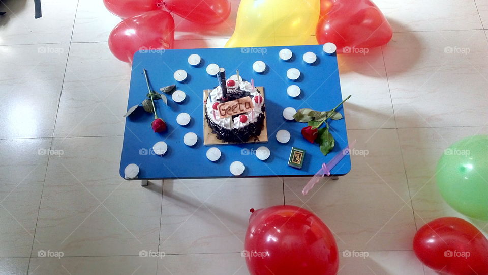 Rose and balloon and cake and candles