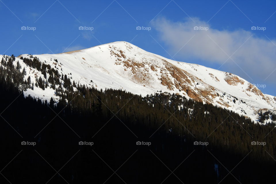 A mountain covered in snow
