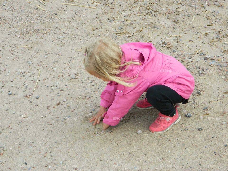 Girl on the beach in autumn