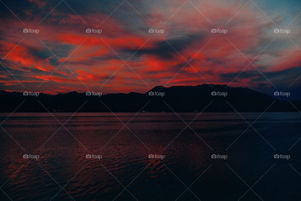 Dramatic sky reflected in lake
