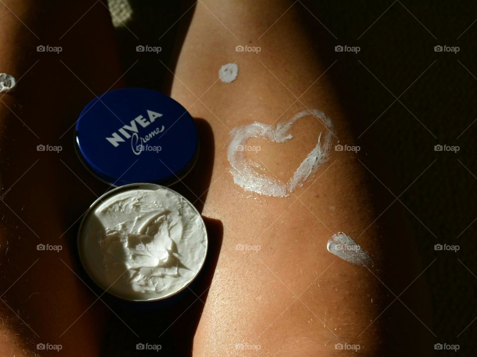 love Nivea cream , skin care, female legs