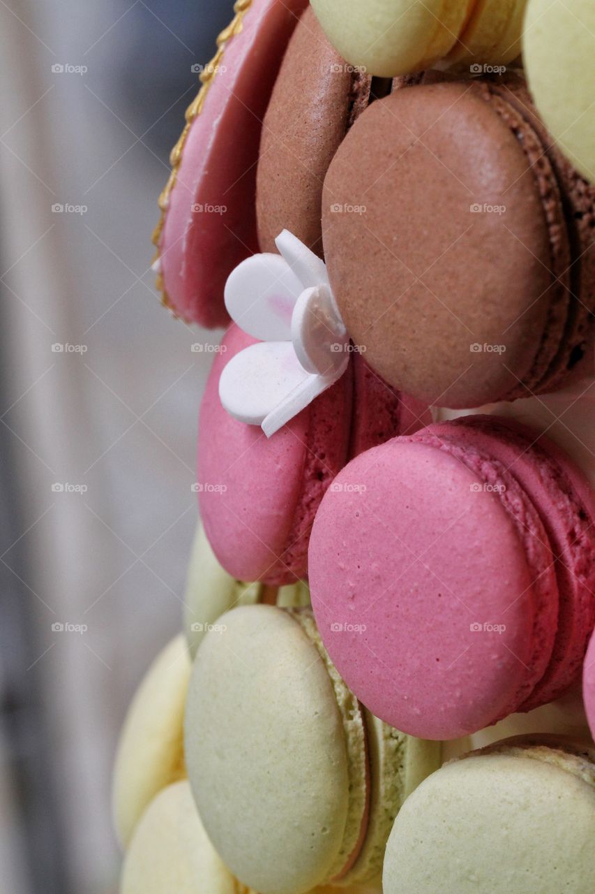 Colourful macaroons in a pile.